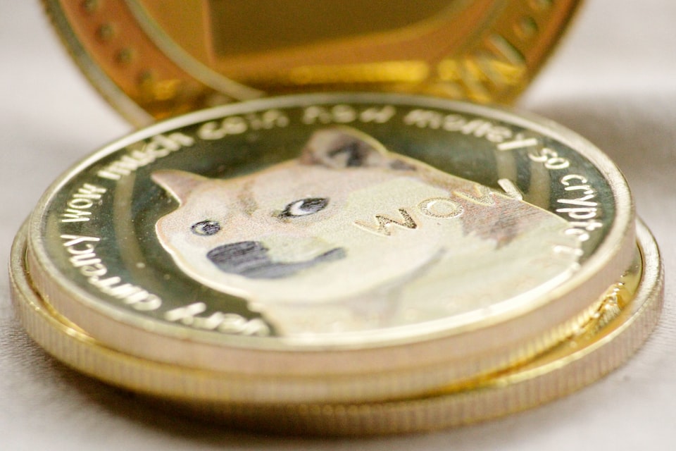 A golden token with the image of Doge, representing Dogecoin.